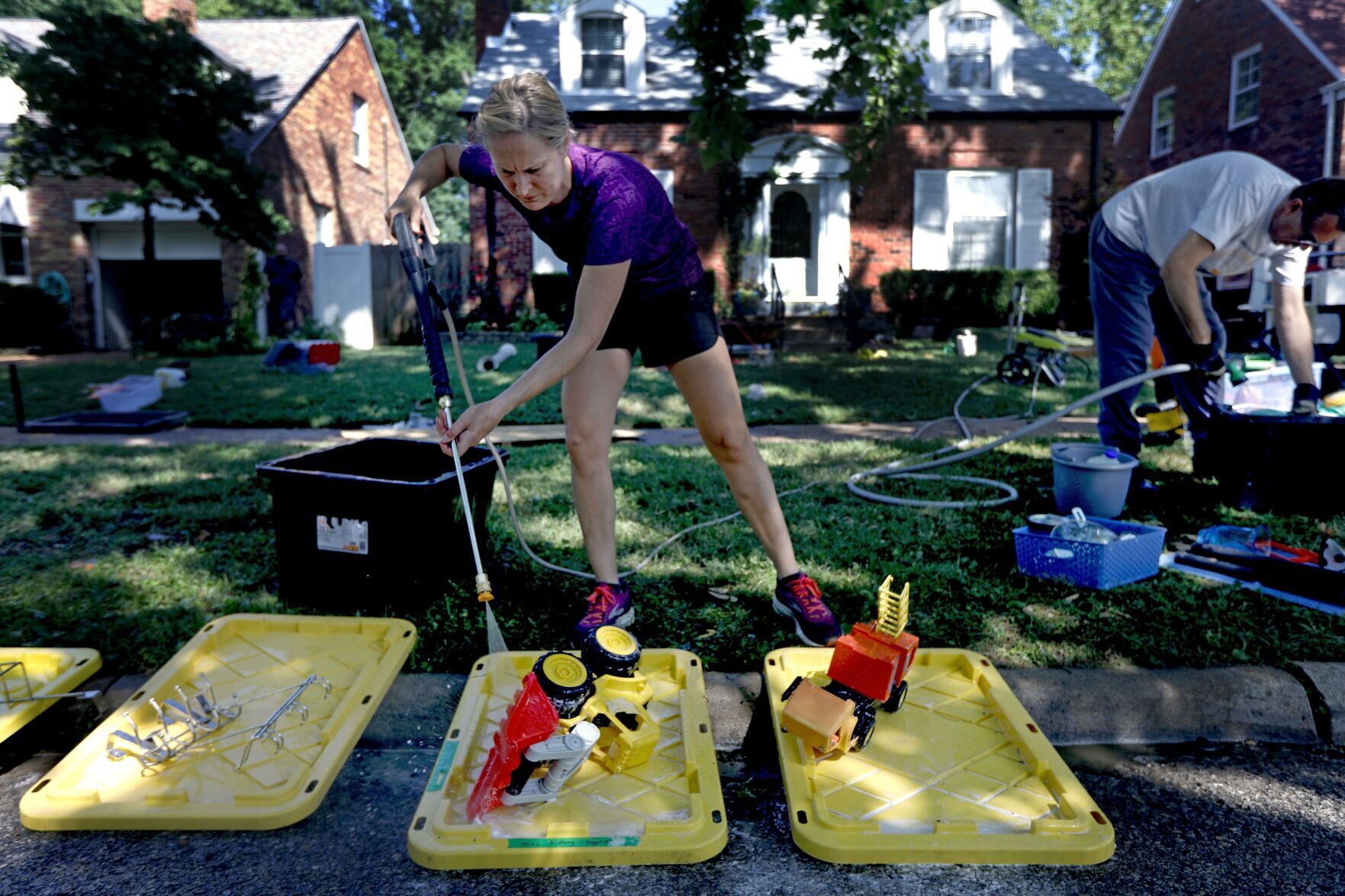 University City residents continue to clean up from flash fooding